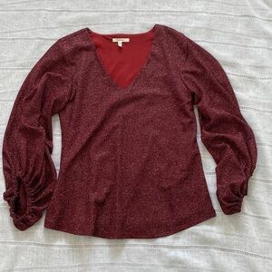 Maurices wine colored v-neck blouse.